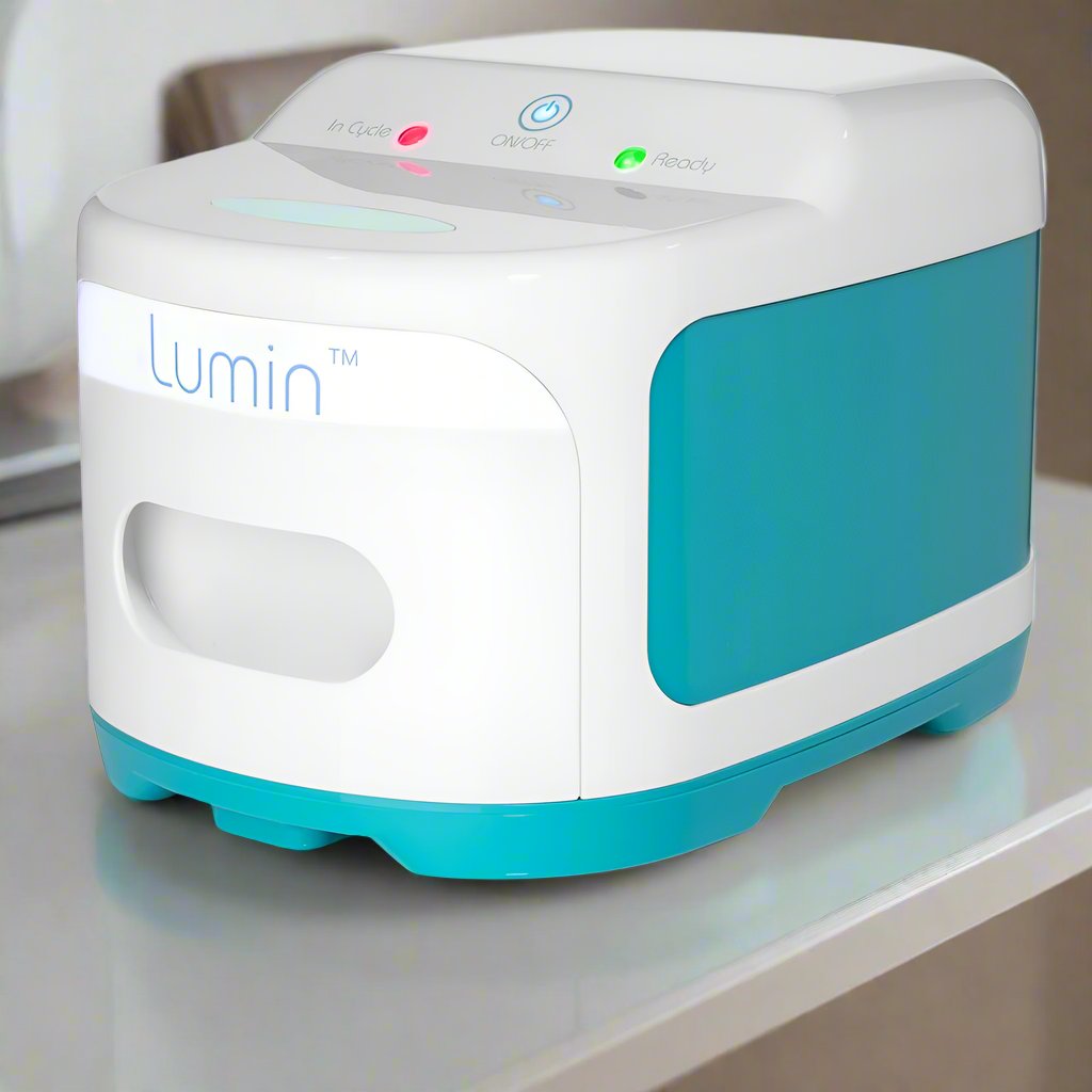 The Lumin UV-C sanitizer sitting closed on a white shelf, ready for its next cycle
