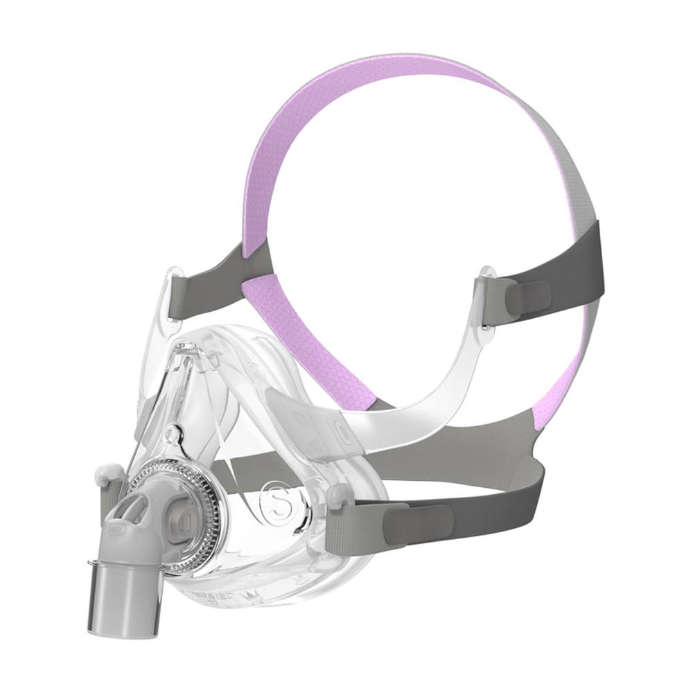 Angled view of the AirFit F10 For Her mask fitted to its headgear with pink crown straps