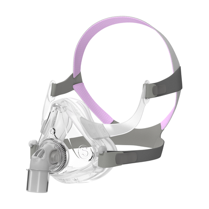 Angled view of the AirFit F10 For Her mask fitted to its headgear with pink crown straps