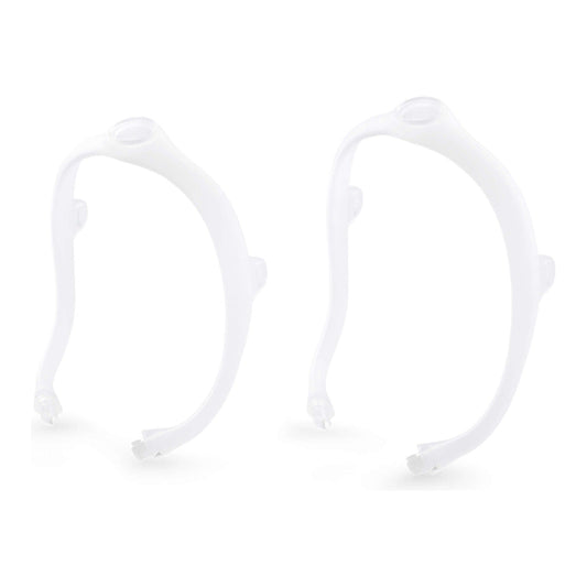 Two Philips DreamWear silicone frames standing front on, without a cushion, headgear or elbow attached