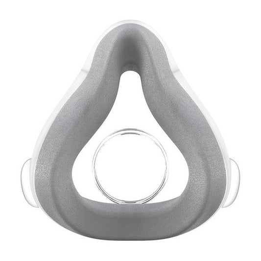 Front view of the ResMed AirTouch F20 cushion, grey UltraSoft memory foam on a clear shell, on white