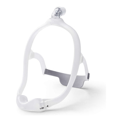 Three-quarter view of a DreamWear frame shown with headgear and elbow, which are sold separately from the frame