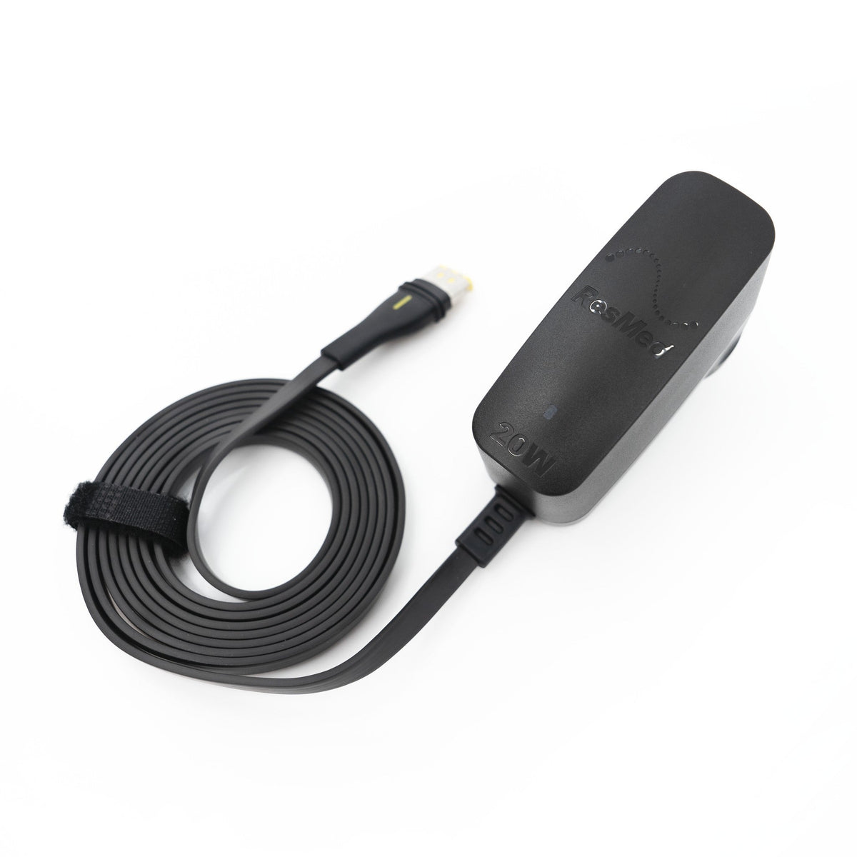 Angled view of the ResMed AirMini 20W power supply showing the 20W label, flat cable and keyed connector