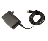 Front view of the ResMed AirMini 20W power supply with its North American wall plug and coiled flat cable