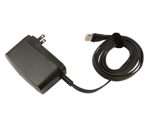 Front view of the ResMed AirMini 20W power supply with its North American wall plug and coiled flat cable