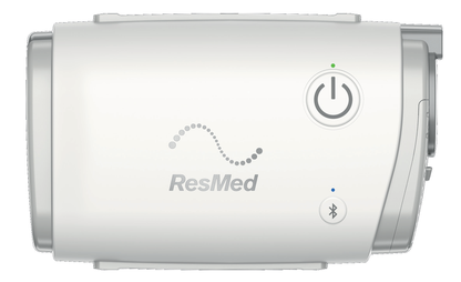 Front view of the ResMed AirMini AutoSet travel CPAP showing the Start/Stop and Bluetooth buttons