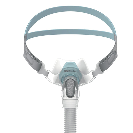 Front view of the Fisher & Paykel Brevida nasal pillows mask, with teal headgear and a grey elbow diffuser
