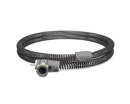 ClimateLineAir Oxy heated tube coiled flat, with the oxygen connector and machine-end cuff facing the camera