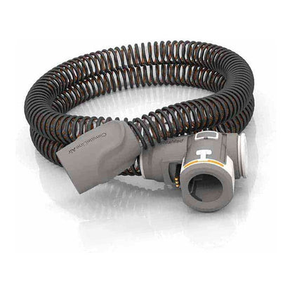 Coiled ClimateLineAir heated tube with its dark ribbed hose and grey cuffs at both ends