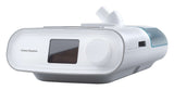 Three-quarter studio view of the DreamStation BiPAP Auto, with the clip-on humidifier at the back