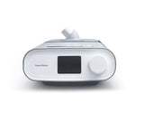 Front view of the Philips DreamStation BiPAP Auto with its humidifier, showing the colour screen and control dial