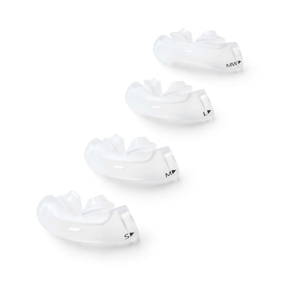 Four DreamWear silicone pillows cushions in a row, Small, Medium, Large and Medium Wide, each marked with its size
