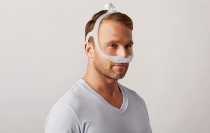 Photo of a man wearing the DreamWear Under the Nose, the frame running along both cheeks