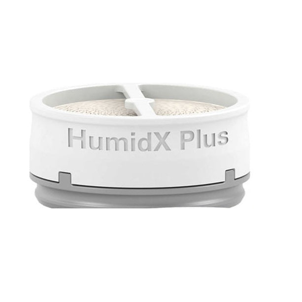 Front view of the ResMed HumidX Plus waterless humidifier for AirMini, a white disc with a grey base