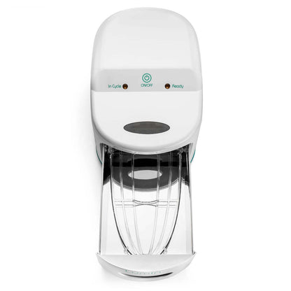 Front view of the Lumin UV-C sanitizer with its drawer pulled open, showing the clear rack and reflective lining