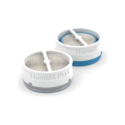 Close view of the two waterless humidifier inserts in the pack, a blue HumidX and a grey HumidX Plus