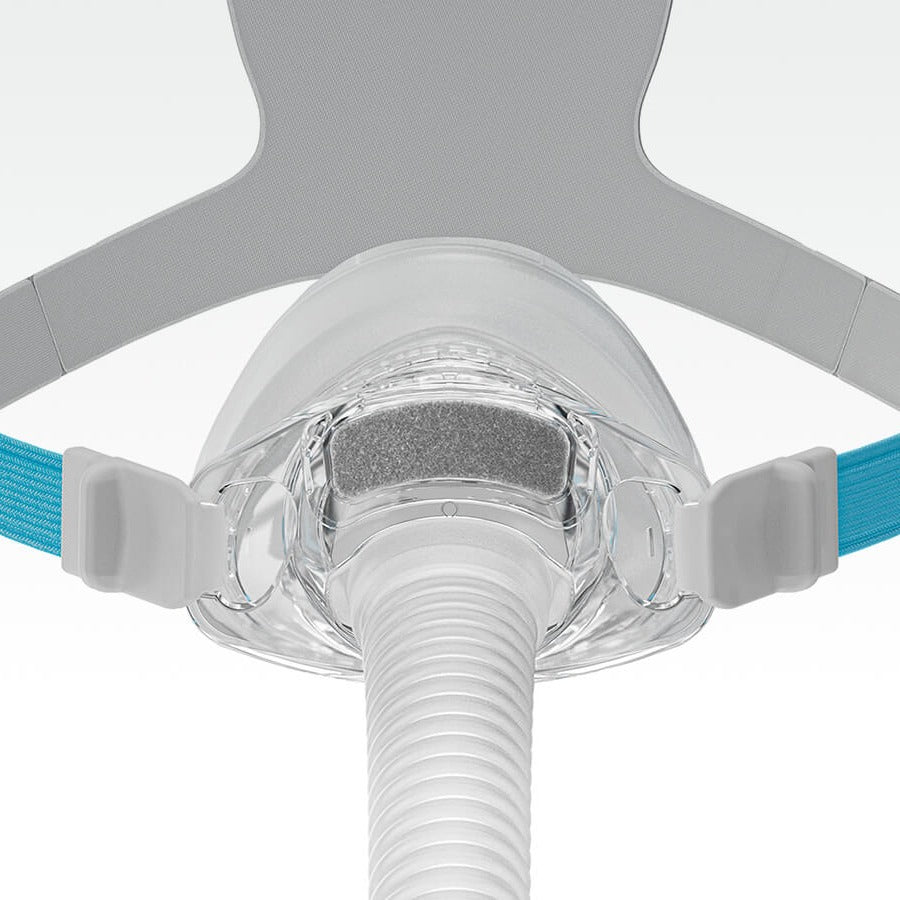 Close front view of the Nova Nasal cushion and frame, showing the grey fabric diffuser above the hose