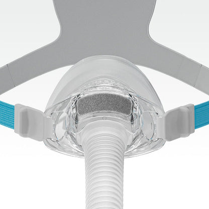 Close front view of the Nova Nasal cushion and frame, showing the grey fabric diffuser above the hose
