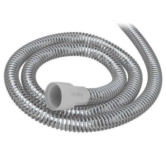 Coiled ResMed SlimLine tube in grey, with the ResMed cuff at one end facing the camera
