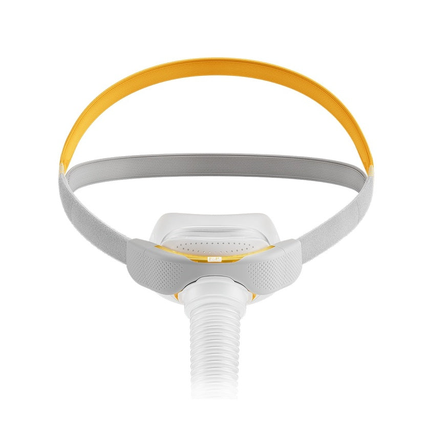 Front view of the Fisher & Paykel Solo Nasal, its cushion below grey and orange AutoFit headgear